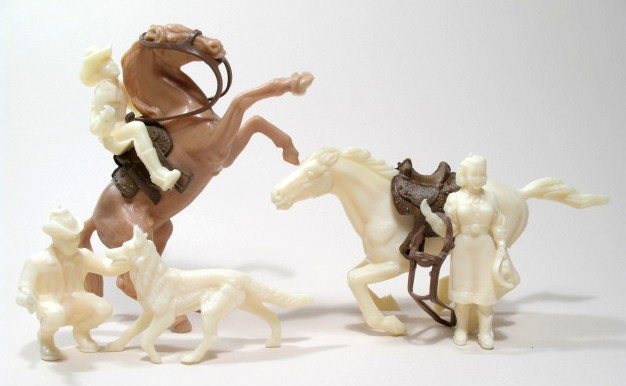 toy cowboys and horses